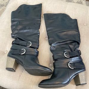Black mid calf boots with buckle detail